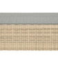 The Zeya Grande Outdoor Coffee Table features a rectangular wicker design with a flat glass top, displayed on a plain white background, highlighting its weather-resistant construction and refined outdoor style.