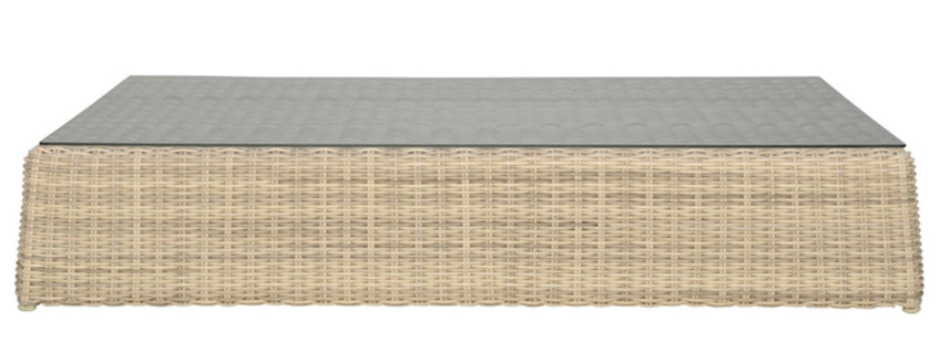 The Zeya Grande Outdoor Coffee Table features a rectangular wicker design with a flat glass top, displayed on a plain white background, highlighting its weather-resistant construction and refined outdoor style.