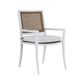 The Bermuda Arm Chair is a modern outdoor dining chair with a white frame, woven resin wicker backrest, and a light gray cushioned seat.
