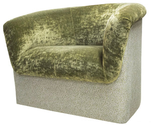 Deco Rolled Arm Chair: A green velvet loveseat with a rounded backrest and a textured light gray base, reminiscent of Art Deco elegance, perfect for any stylish interior.