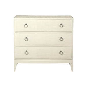 The Connie Raffia Chest features three drawers with metal ring handles, finished in cloud white raffia, and is shown against a plain white background.
