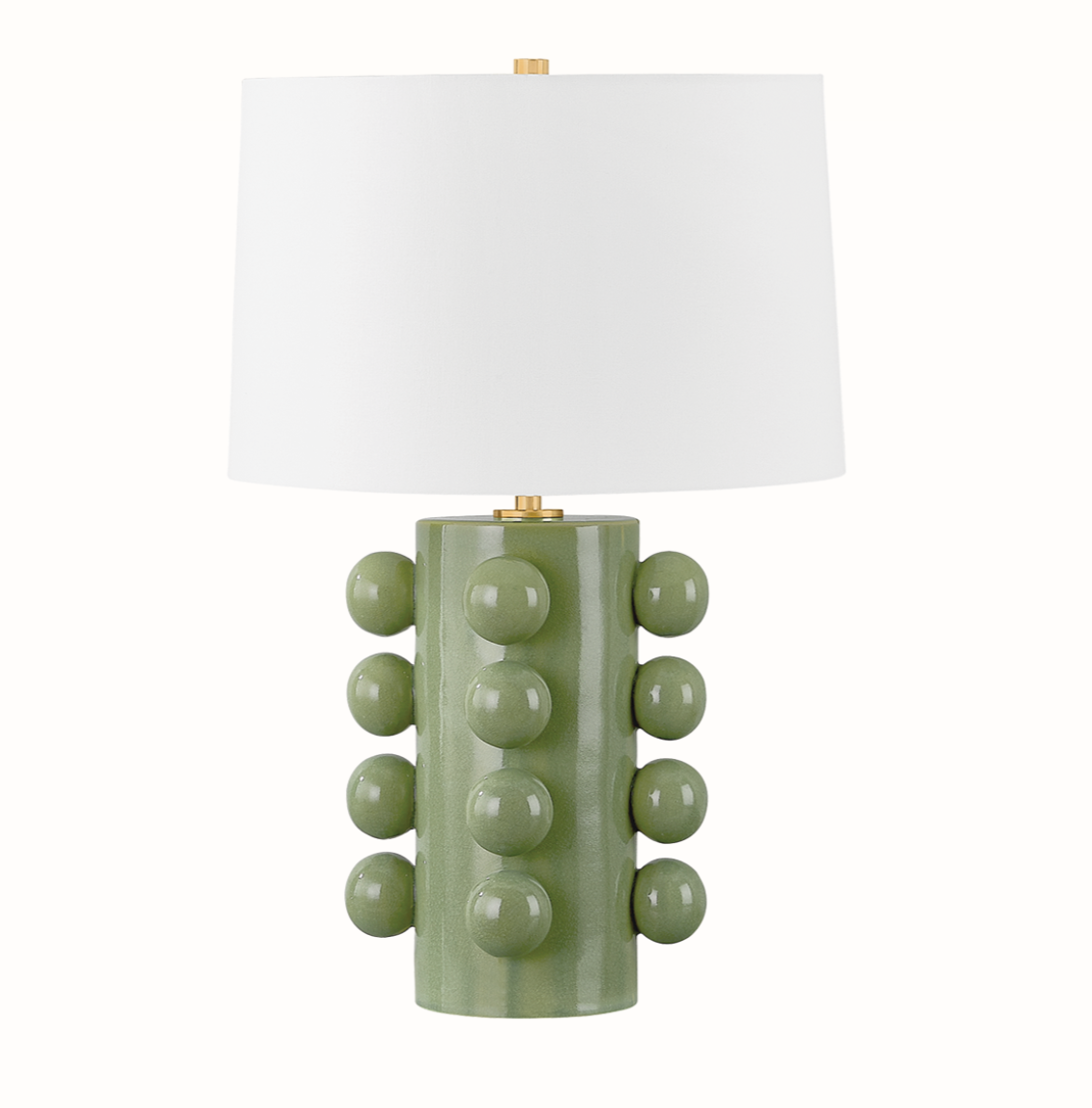 Roselle Table Lamp with a green ceramic base adorned with raised round bumps and topped with a linen drum shade, shown against a plain background.