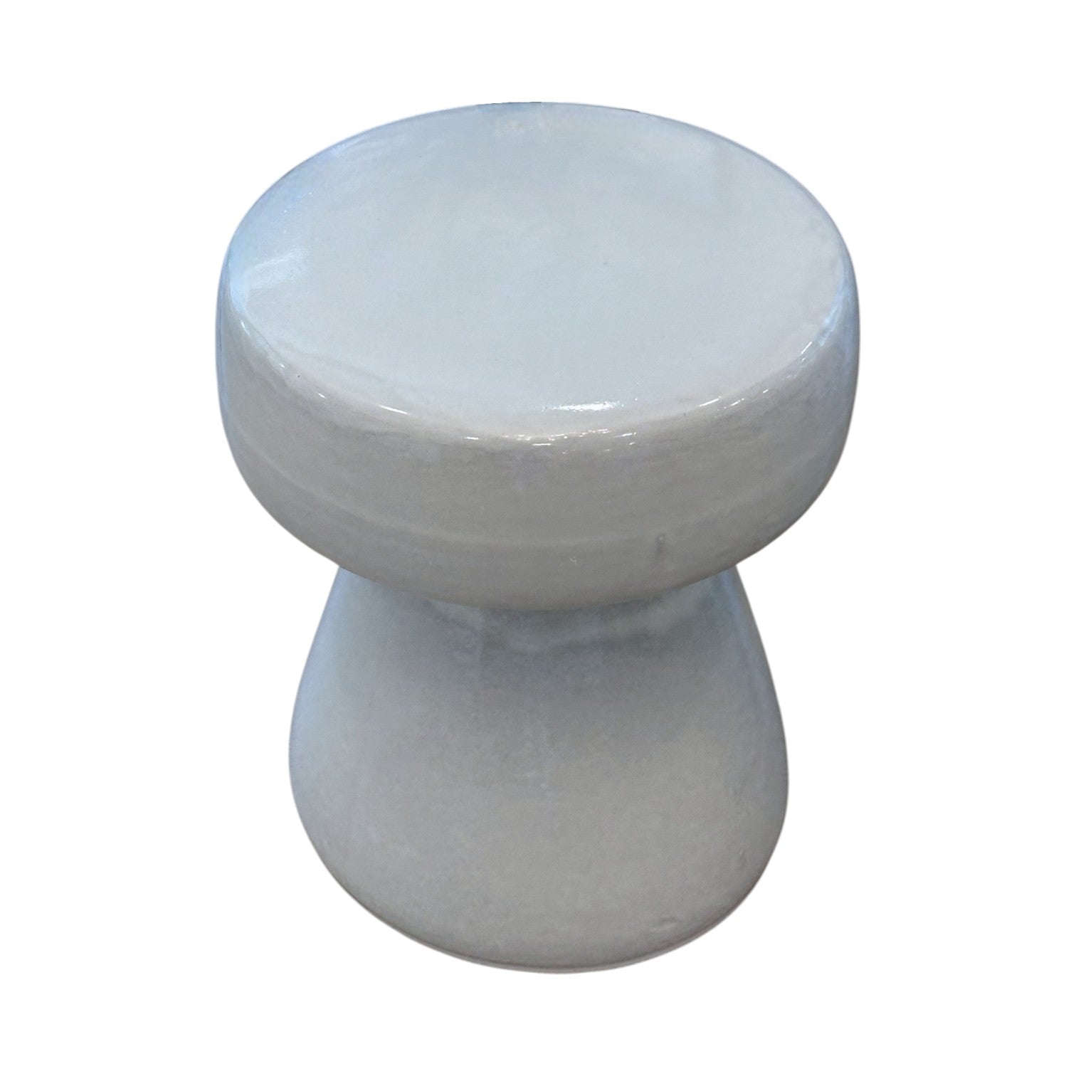 The Mushroom Stool is a small, round, mushroom-shaped accent piece with a wide top and flared base made from white porcelain. Photographed on a plain white background, it brings charm to any space.