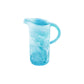 The Nashi Home Serveware Collection, Aqua features a translucent blue resin pitcher with a handle and marbled design, adding a modern touch to your home decor against a crisp white background.