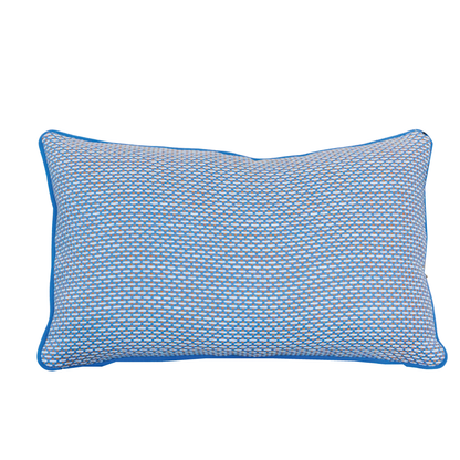Introducing the Arles Paon Outdoor Lumbar Pillow, featuring a blue and white geometric pattern complemented by solid blue piping along the edges. Displayed against a white background, this expertly crafted 22" x 22" pillow is part of our Custom-Made Pillows collection—perfect for adding a stylish accent to your space.