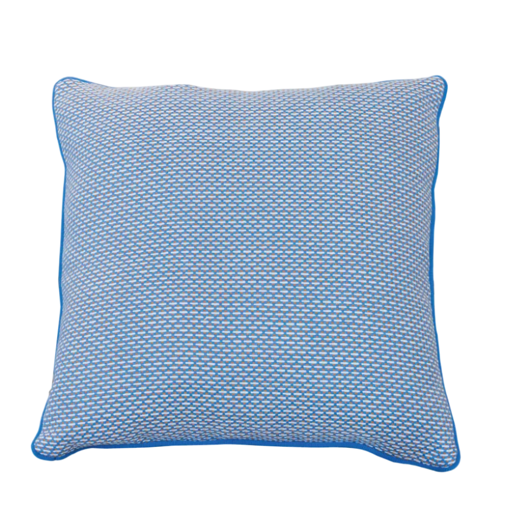 Arles Paon Outdoor Pillow in a square shape, featuring blue and white textured fabric with blue piping, shown against a white background.