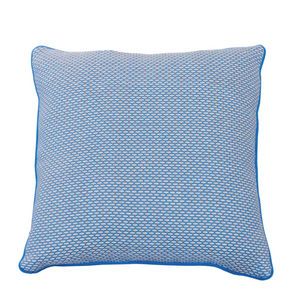 Arles Paon Outdoor Pillow in a square shape, featuring blue and white textured fabric with blue piping, shown against a white background.