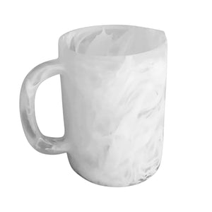 Arila Jug: A white ceramic jug featuring a marbled swirl pattern, reminiscent of resin, shown isolated on a white background.