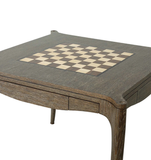 The Bembridge Games Table in Dark Oak features a built-in chessboard on its wooden surface, two drawers, and elegant curved legs—an ideal choice for enthusiasts seeking both style and function.