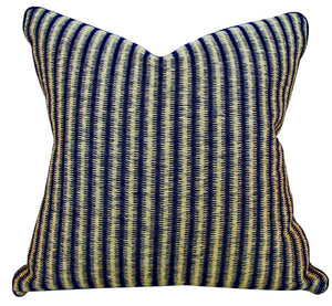 A Baleen Pillow with a blue and white vertical striped pattern offers elegance and comfort, ideal for any decor.