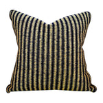 The Baleen Pillow is a square, down-filled decorative pillow featuring bold black and yellow vertical stripes on a white background.