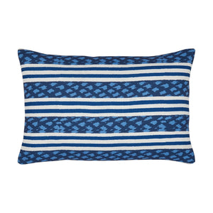 The Banita Outdoor Lumbar Pillow showcases horizontal stripes in varying shades of blue and white, accented by geometric patterns woven into weather-resistant fabric.
