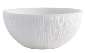 A white textured bowl with a rough, uneven surface, resembling a Chiseled Alabaster Bowl, Large.