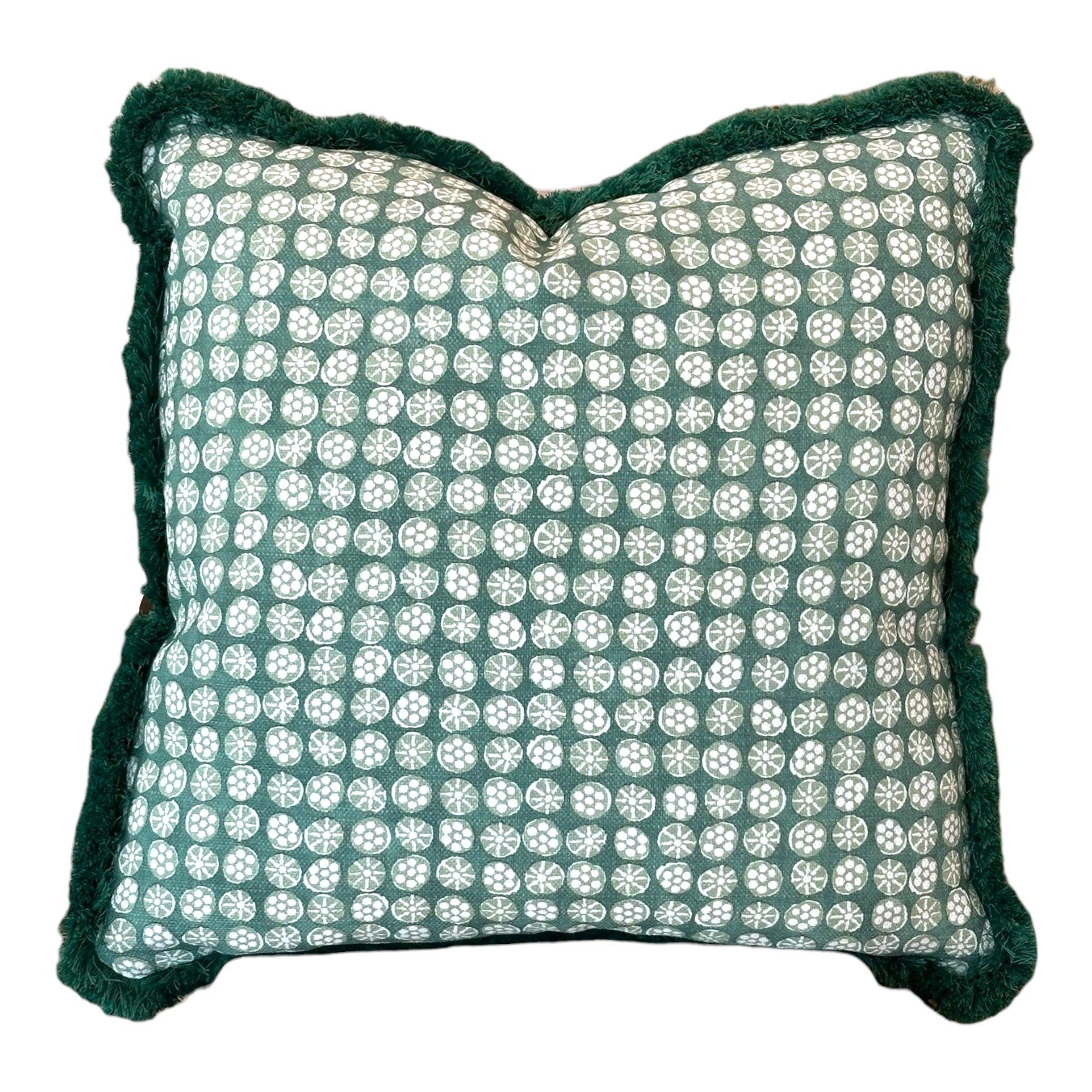 The Boheme Green Outdoor Pillow features a green and white circular pattern, dark green textured edges, and slightly puckered corners, making it a striking luxury accent for any space.