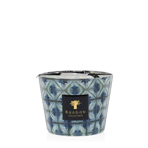 A Baobab scented candle from the Bohomania Kilan Candle Collection with incense in a blue geometric-patterned glass container.