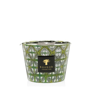 A Baobab Collection Bohomania Lazlo Candle in a green, white, and black patterned glass holder. It has a black label with the brand logo and name on the front, adding a touch of elegance.