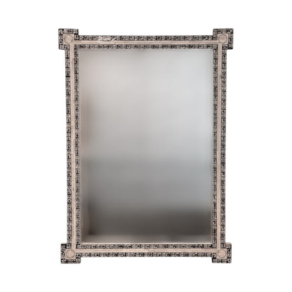 The U645 Ebony Penwork Mirror is a rectangular artisanal piece with an ornate frame featuring geometric and floral patterns at the corners.
