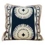 The Bora Bora Lava Black Pillow is a square accent pillow with a black and beige geometric pattern, featuring Polynesian-inspired circular designs and fringe trim along the edges.