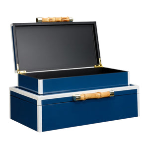 The Kalena Box in Navy, Large is a rectangular blue and white storage box with an organic look, bamboo handle, and a lid that can be propped open.