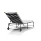 The Amalfi Chaise Lounge is a black metal outdoor chair with a white cushion, mesh backrest, and two small rear wheels, displayed on a white background.