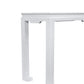 A close-up of the corner of the Wylder Console, a classic white rectangular table with straight legs, set against a plain white background.