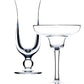 Two empty acrylic glassware pieces: a tall champagne flute on the left and a wide-rimmed margarita glass on the right, perfect for island-inspired cocktails. Both are part of the Bold Calypso Acrylic Collection, with their clear design inviting thoughts of sipping colder drinks on a tropical escape, set against a white background.