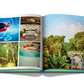 An open book displays photos of a scenic outdoor path surrounded by trees on the right page and a collage of luxurious family retreat images on the left, weaving personal tales of tranquility and adventure in Chic Stays.