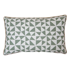 The Circus Lumbar Pillow features a white background with green geometric triangles and tan piping. Handmade from premium materials, it offers lasting comfort and adds a stylish touch to any space.