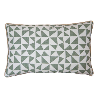 The Circus Lumbar Pillow features a white background with green geometric triangles and tan piping. Handmade from premium materials, it offers lasting comfort and adds a stylish touch to any space.