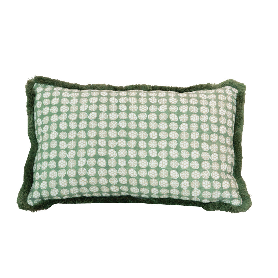 Boheme Outdoor Lumbar Pillow in a rectangular shape features a green fabric with a white circular pattern, dark green fringe trim around the edges, hidden zipper closure, and plush polyester fill, shown on a white background.