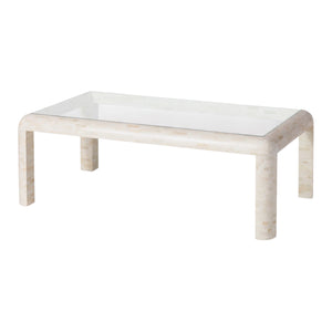 The Harley Natural Bone Coffee Table features a rectangular glass top with four rounded, light-colored bone legs and frame, creating a modern yet natural look.