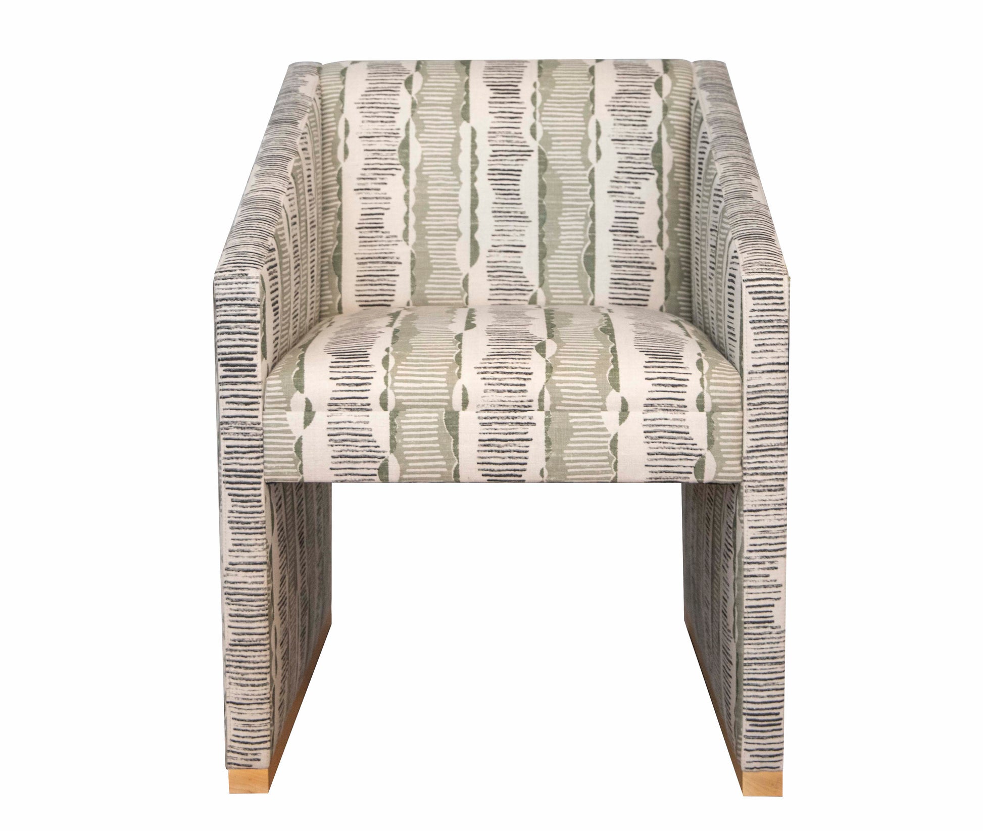 A Dune Dining Chair showcasing easygoing elegance with its rectangular shape, green and white patterned fabric, and Bleached Walnut wooden legs.