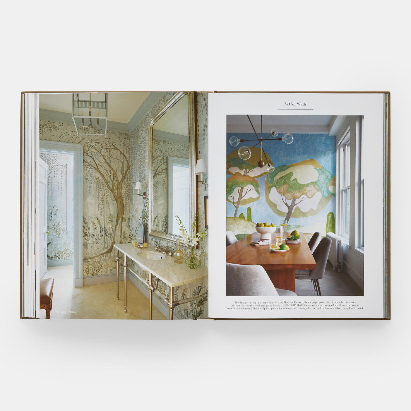 An open book showcasing interior designs: a vanity area with nature-themed wallpaper on the left page, and a dining area with tree murals on the right page, titled "Decorate Like a Decorator: All You Need to Know to Design Like a Pro." Discover decorator pro moves that transform a room with these artful touches.