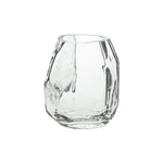 The Denali Vase features a clear, faceted geometric design with an irregular shape, highlighting minimalist style against a white background.