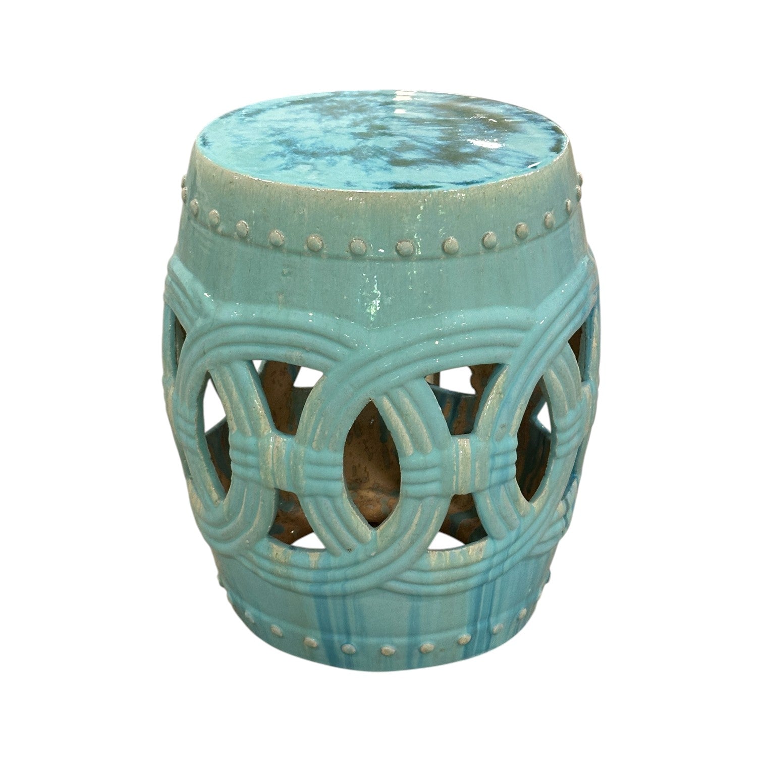 The Mint Circle Garden Stool features circular cutout patterns, a glossy mint ceramic finish, and an antique look inspired by traditional dragon kiln craftsmanship.