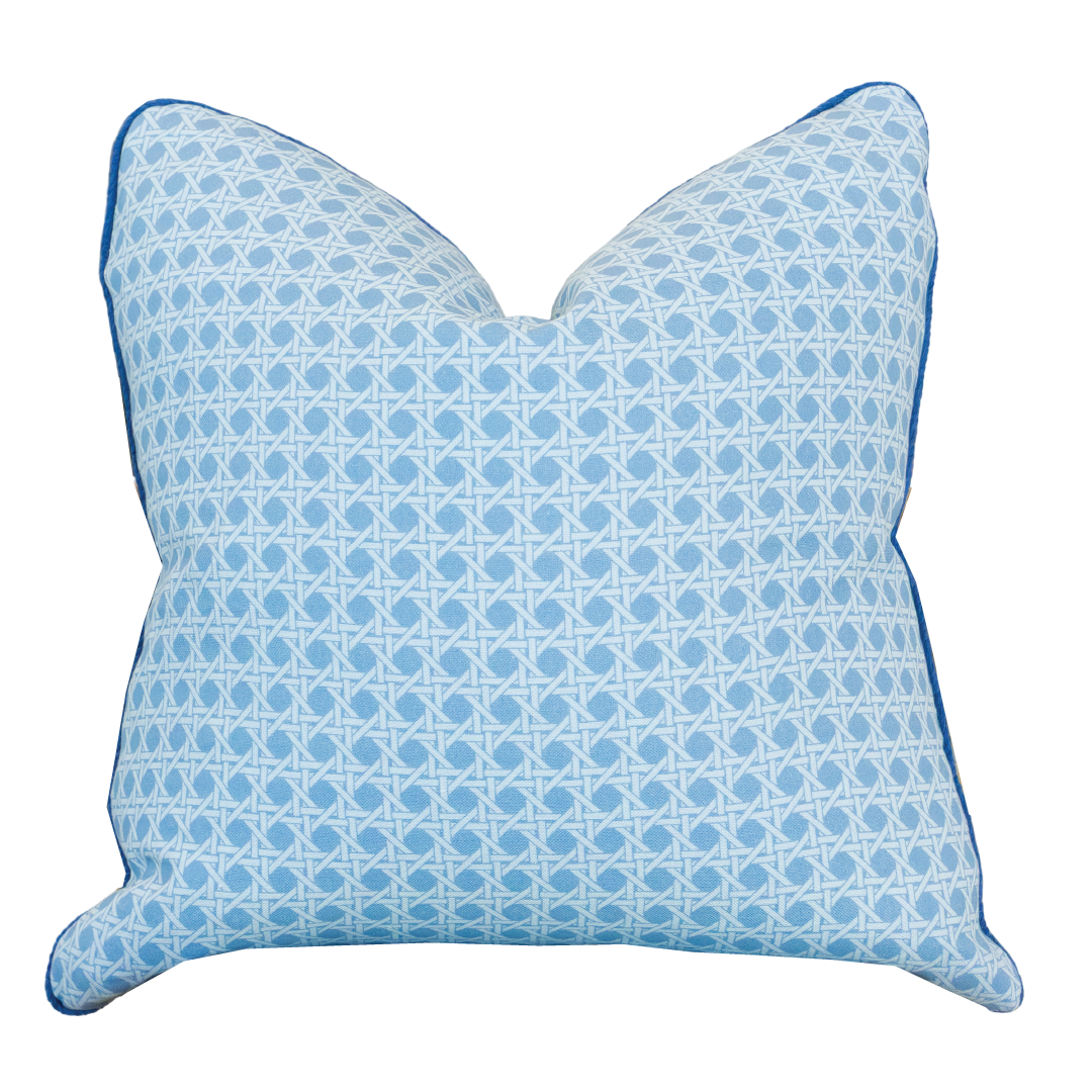 Cane Mineral Pillow: This custom-made 22" x 22" square pillow features a light blue and white geometric pattern with blue piping along the edges, set against a white background. Filled with 100% down, it offers luxurious comfort and style.