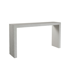 The Lance Console Table features a rectangular white design with a minimalist look and textured geometric patterns on the legs and sides, photographed against a plain white background.