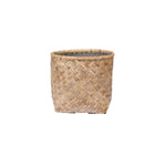 The Zayn Round Bamboo Planter, crafted from natural light-colored bamboo, brings organic charm to any indoor or outdoor space. Shown against a plain white background.