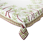 The Kim Seybert Oasis Tablecloth showcases green palm trees with brown trunks and a coordinating green and brown border, bringing an island-inspired touch to your table.