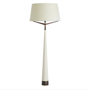 The Elden Floor Lamp features a modern cone shape with a tapered white base, heritage brass accents, and a large white linen shade, shown against a plain white background.
