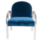 This image shows an Elva Acrylic Arm Chair with a blue velvet seat, transparent acrylic arms, and legs. The vintage-style chair features a curved backrest and a cushioned seat for added comfort.