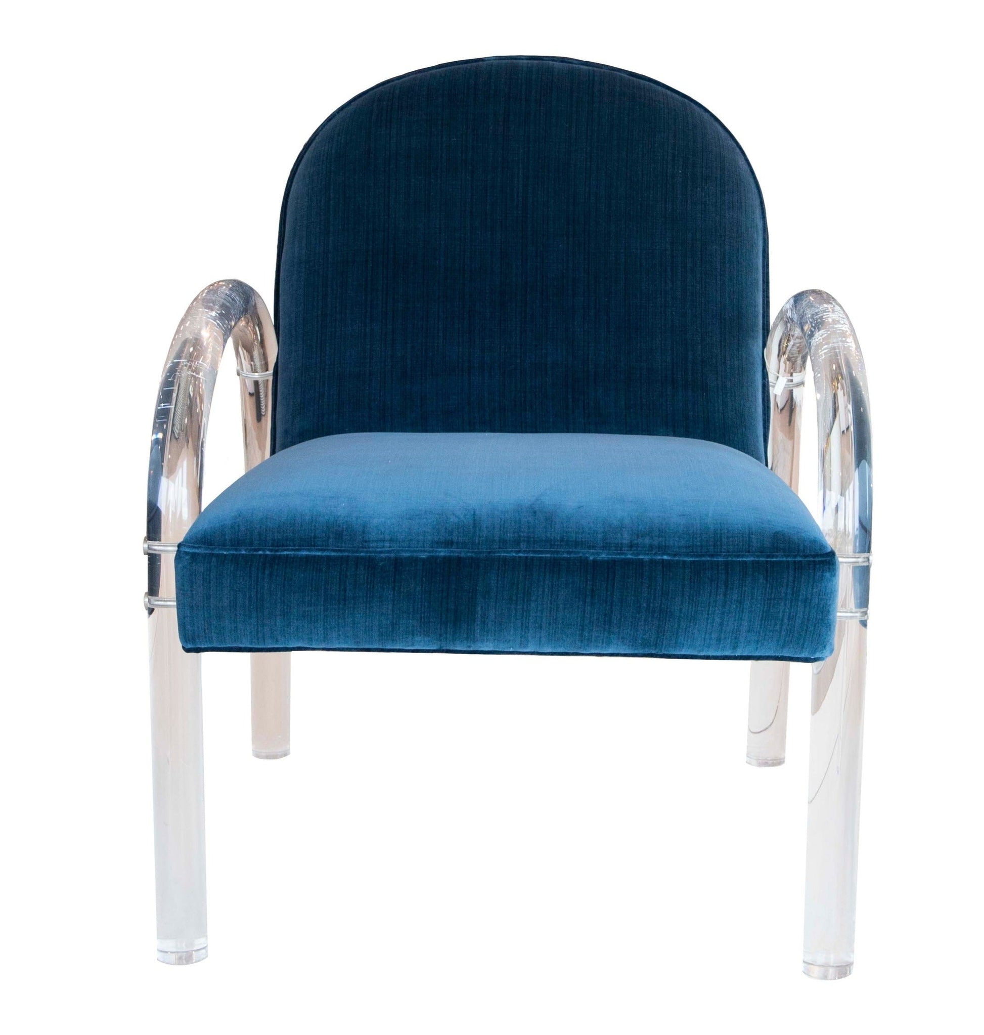 This image shows an Elva Acrylic Arm Chair with a blue velvet seat, transparent acrylic arms, and legs. The vintage-style chair features a curved backrest and a cushioned seat for added comfort.