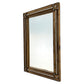 The H80 Wood Mirror features a rectangular wooden frame with beaded detailing and round floral accents at each corner, adding artisanal elegance.