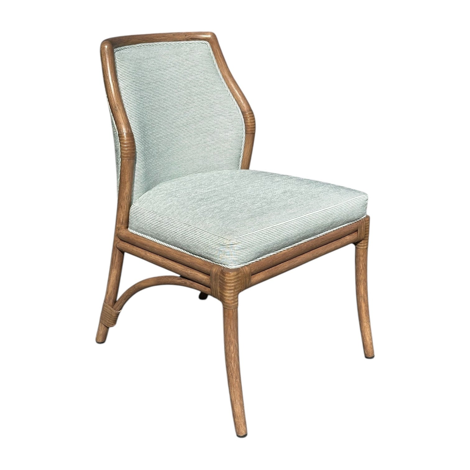 The Lantana Side Chair features a modern wooden frame, curved legs, and light blue custom fabric on the seat and backrest.