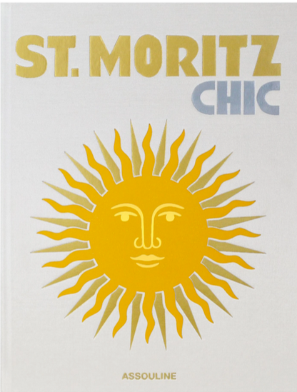 Replace with product name and brand name: Assouline's "St. Moritz Chic" book cover, highlighting luxury travel with a graphic of a sun with a face, featuring content on the Snow Polo World Cup.