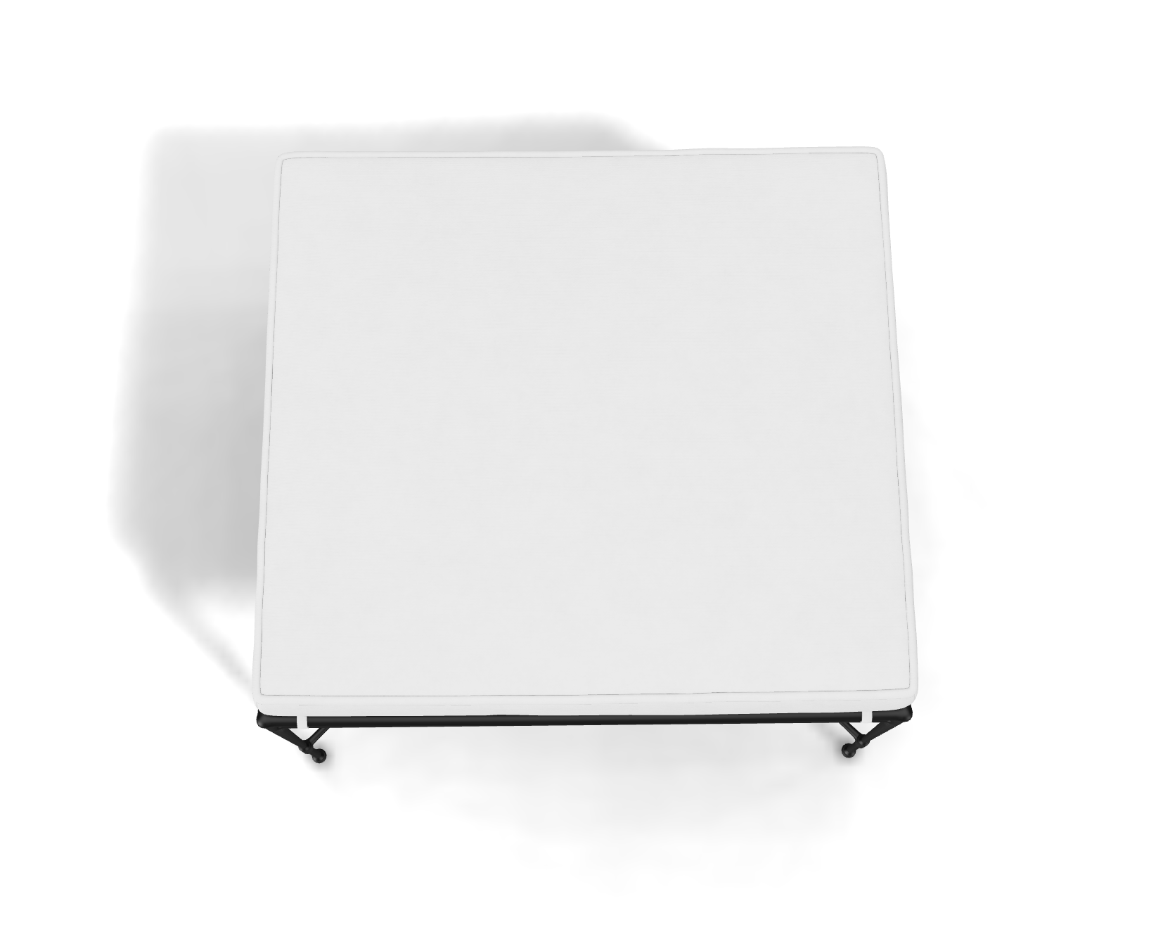 The Amalfi Ottoman, featuring a minimalist design, rests on a hand-forged steel black stand and is viewed from above, casting a faint shadow to the left.