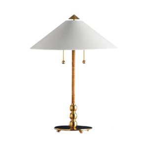 The Flare Table Lamp, Aged Brass, features a black finish, round base, textured stem, wide white conical shade, and two pull chains—ideal for adding sophisticated style to any décor.