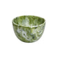The Nashi Home Serveware Collection, Forest features a green and white marbled resin bowl with a smooth, rounded shape—ideal for serving or as a stylish home decor accent.