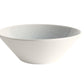 The Jars Vuelta White Pearl Collection bowl, featuring a plain white ceramic design with a slightly textured interior, exudes classic elegance and showcases its timeless appeal.