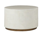 A sleek Boyd Coffee Table, Small with a round, white faux horn finish and a wooden base, featuring a minimalist design.